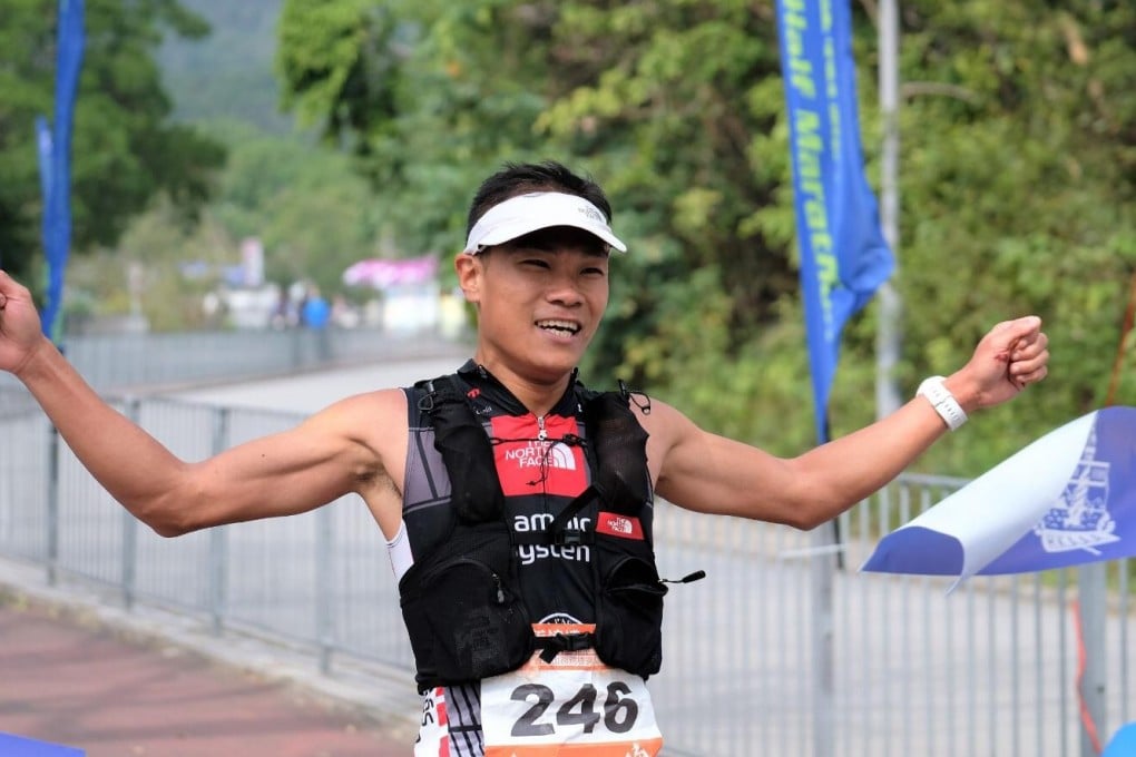 Wong Ho-chung raises his arms at the finish. Photo: HKAAA