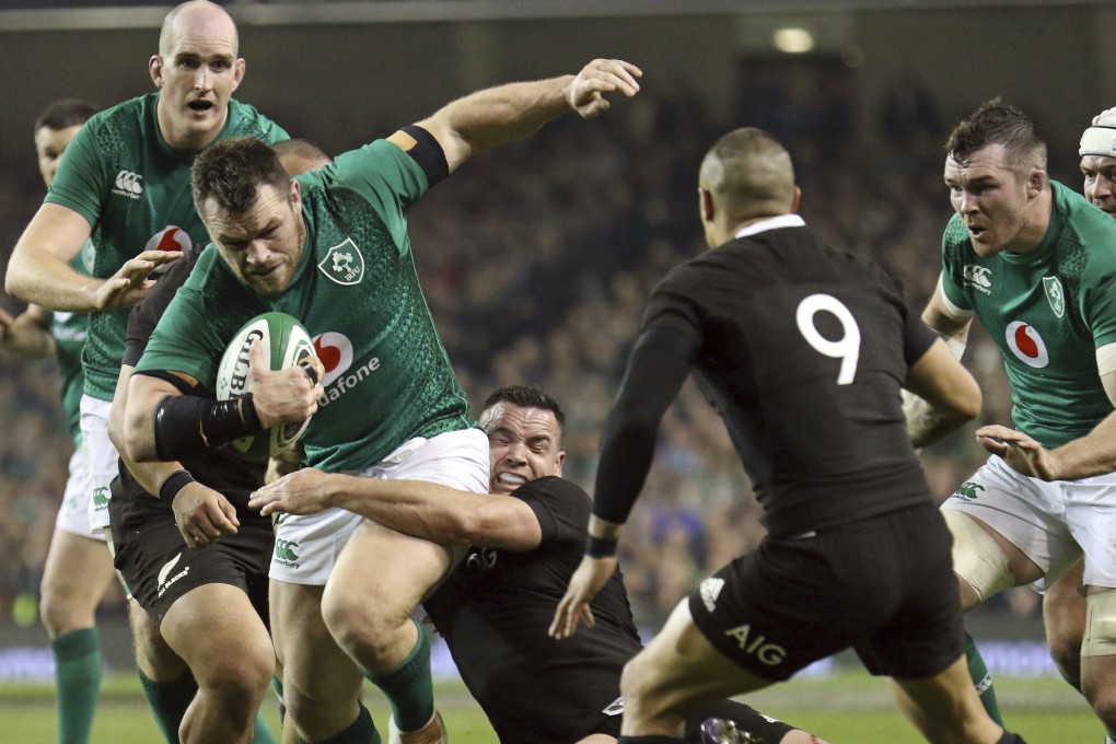 Ireland's Cian Healy runs with the ball during the rugby union international between Ireland and the New Zealand All Blacks. Photo: AP