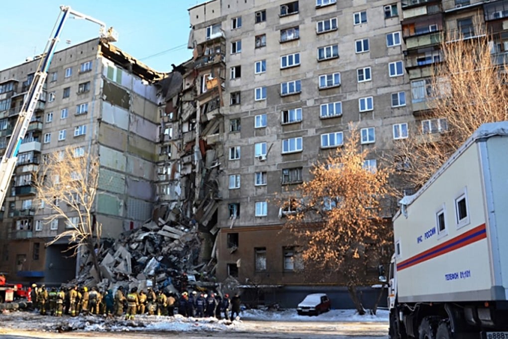 Rescuers moving debris after a gas explosion in Magnitogorsk, Russia, on Friday. Photo: EPA/Russian Emergency Situations Ministry