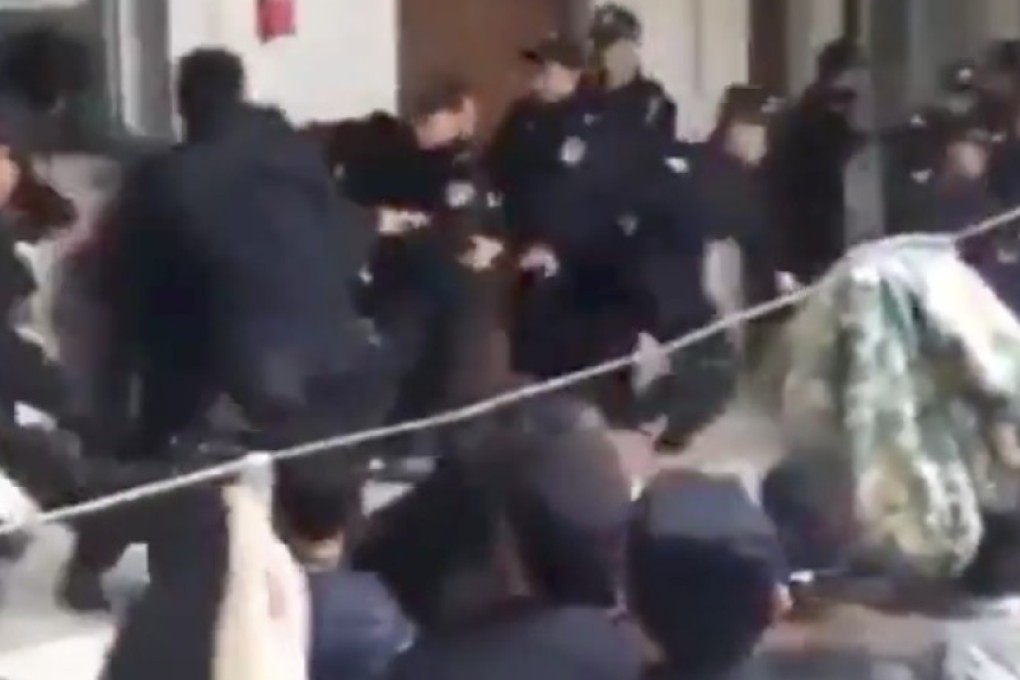 Video footage captured police officers harassing Hui Muslim worshippers after Chinese authorities ordered three mosques in Weishan country, Yunnan province, chained shut to await demolition. Photo: Handout