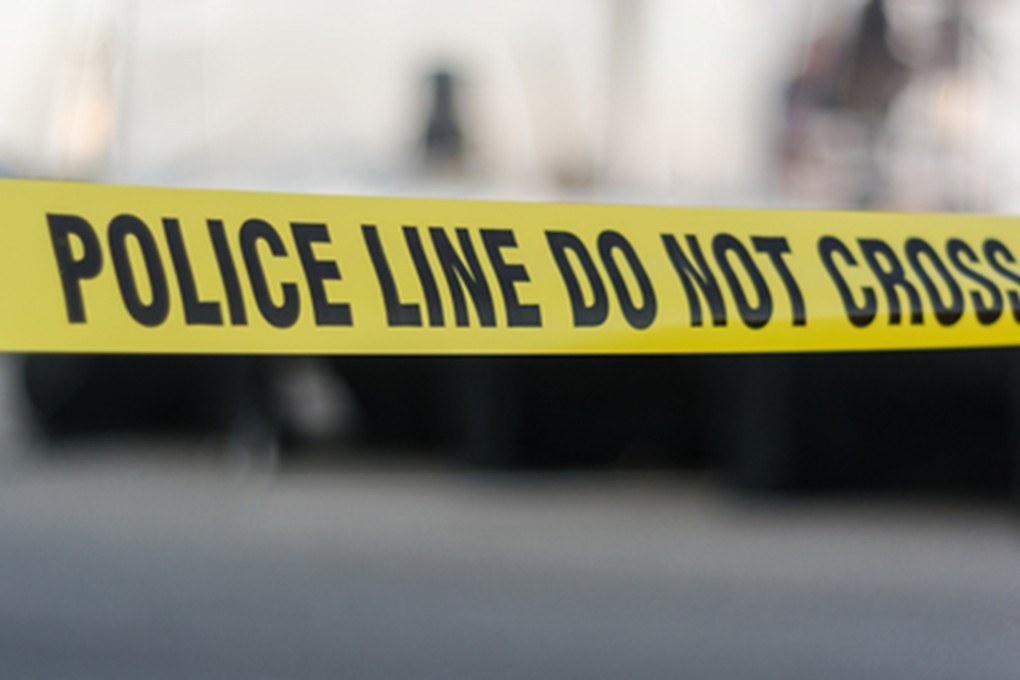 Police tape cordons off a crime scene. A man in Thailand has shot dead six family members including two of his own children. Photo: Tribune News Service