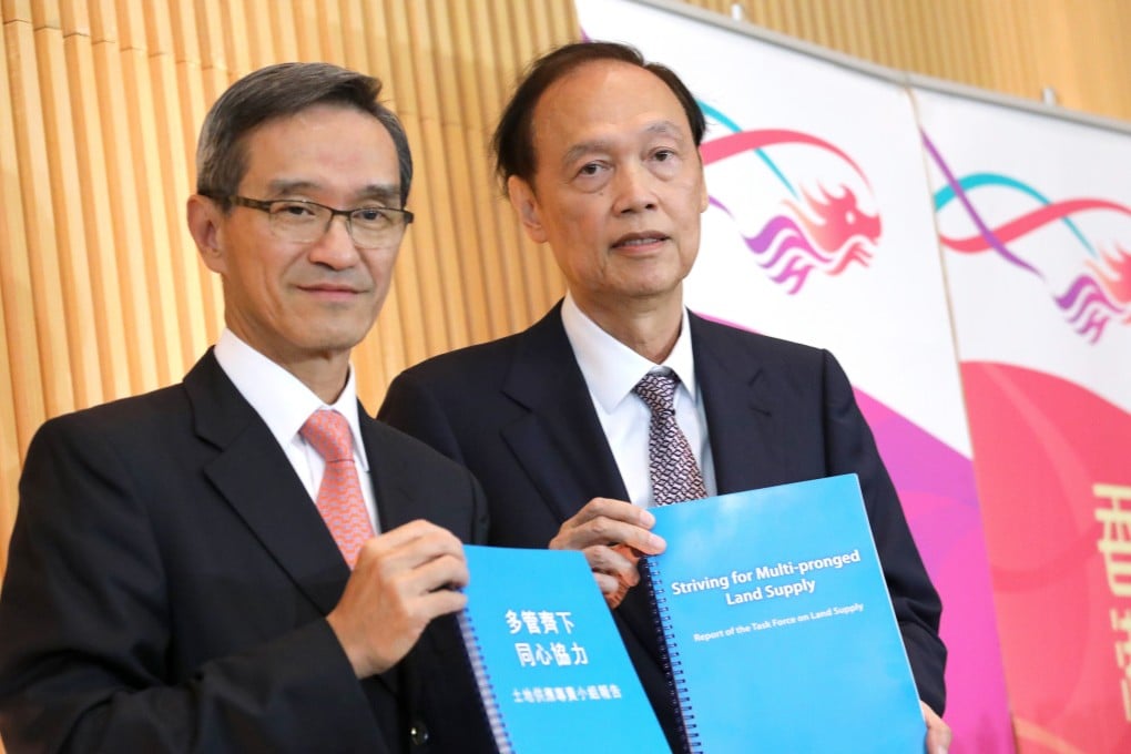 Stanley Wong (left) and his vice-chairman Greg Wong meet the media at the launch of the Report of the Task Force on Land Supply at government headquarters. Photo: Felix Wong