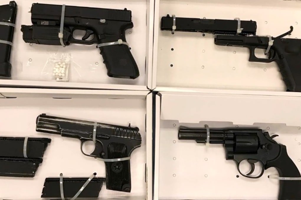 Among the weapons seized were 11 imitation rifles and seven imitation pistols. Photo: HK Police