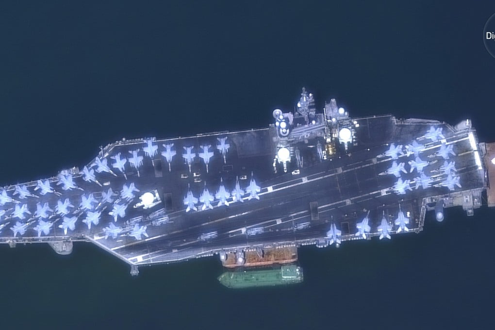 This March 6, 2018, satellite image provided by DigitalGlobe shows The USS Carl Vinson off the coast of Da Nang, Vietnam, its deck packed with warplanes. Photo: DigitalGlobe, a Maxar company via AP