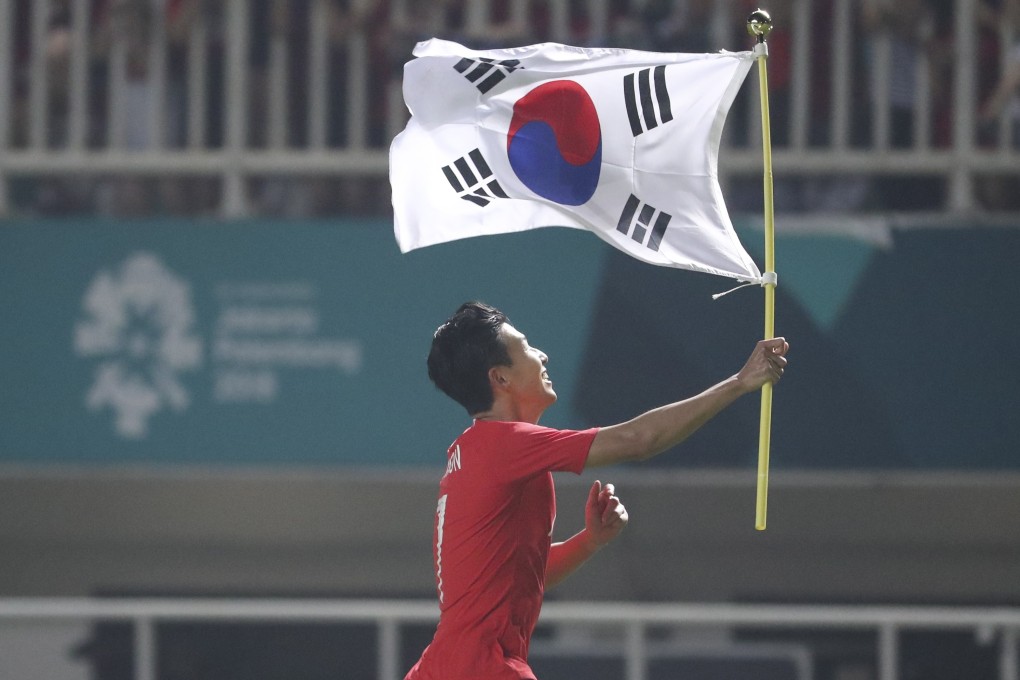 South Korea’s Son Heung-min celebrates after winning the gold medal soccer match at the Asian Games 2018. Photo: EPA