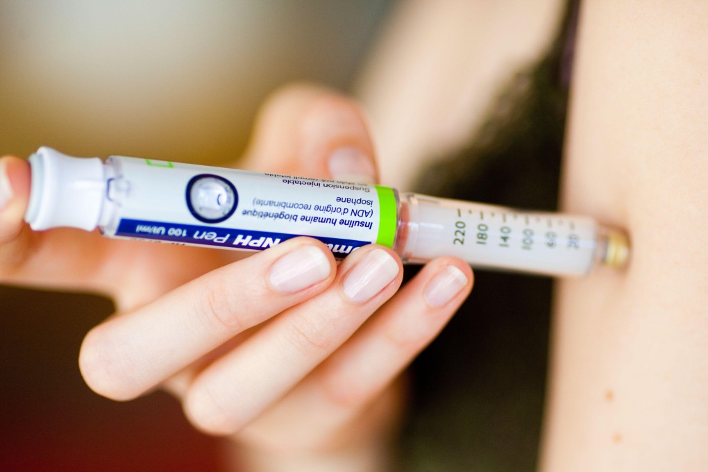 A diabetes patient administers an insulin injection. Photo: Handout
