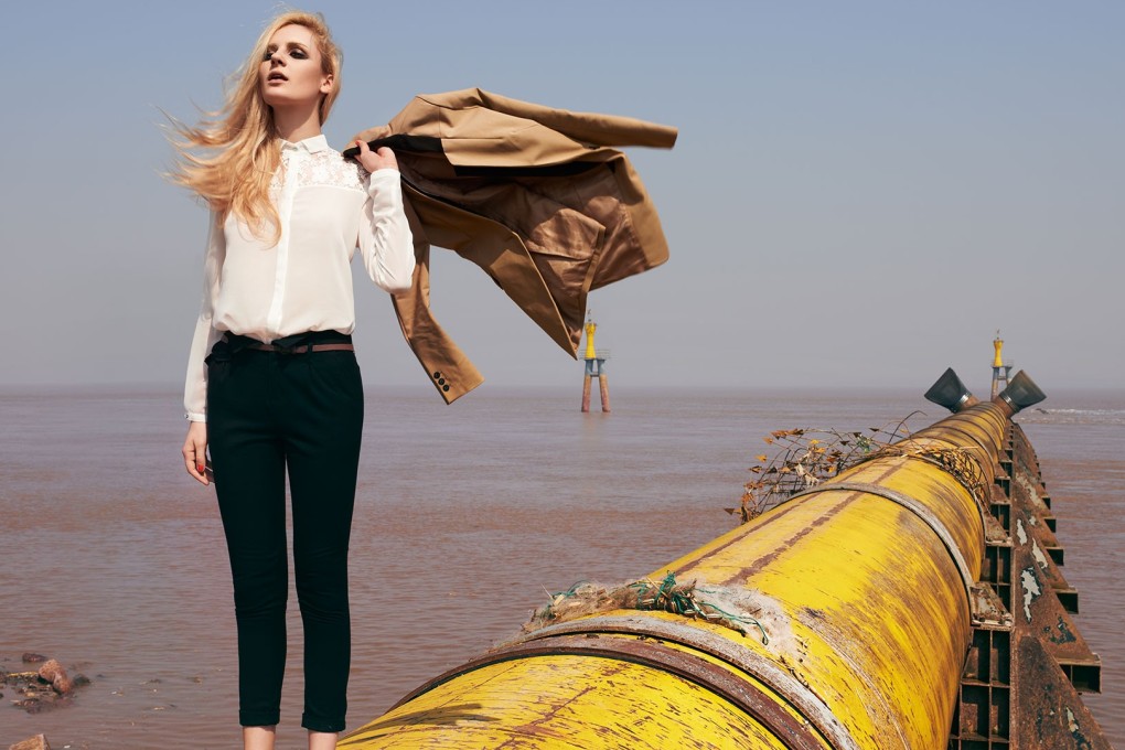 Out of fashion: a photo shoot in the heart of China’s textile industry, on the bank of Qiantang River, in Zhejiang province, shows the scale of the toxic water pollution that currently occurs in order to supply a global market with its fast-fashion fix. Picture: Lance Lee for Greenpeace