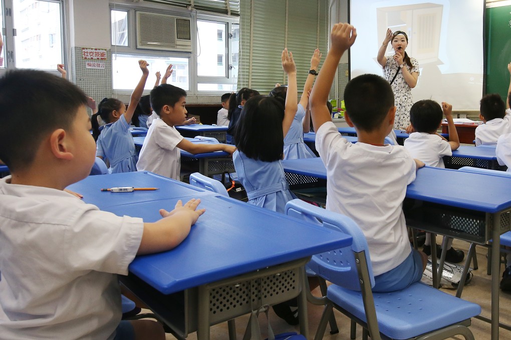 Teacher in a class at GCCITKD Cheong Wong Wai Primary School in Sha Tin. More than 10 per cent of the 630 pupils in the school have special educational needs ranging from autism to attention deficit hyperactivity disorder. David Wong