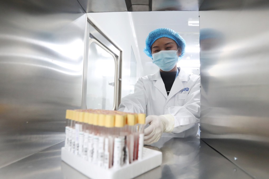 A technician works at a BGI genetic testing laboratory in Kunming, Yunnan province. Gene-profiling may be the future of medicine, but basic issues like access to health care still plague medical systems. Photo: Reuters