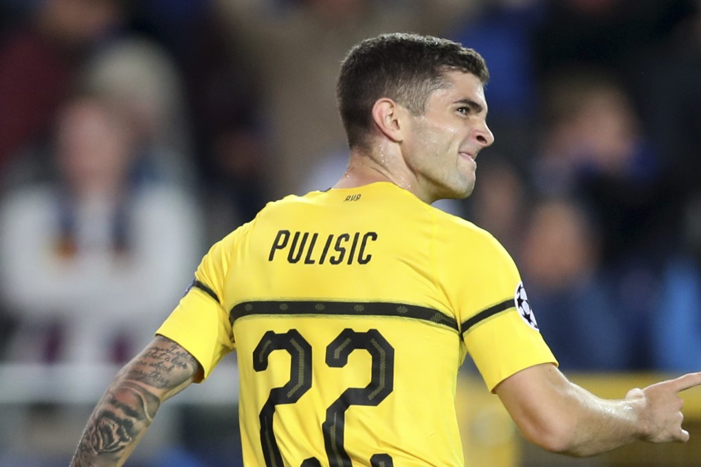 Borussia Dortmund’s Christian Pulisic celebrates scoring in the Champions League against Club Brugge. Photo: AP