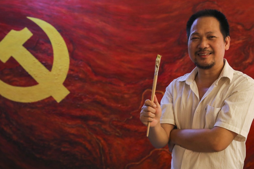 Yang Yongshi, an oil painter, at Dafen Oil Painting Village in Shenzhen. Photo: Edward Wong