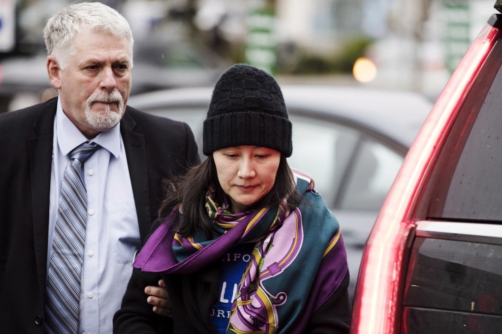 Huawei chief financial officer Sabrina Meng Wanzhou arrives at a parole office with a security guard in Vancouver, British Columbia, as a condition of her US$7.4 million bail arrangement. Photo: AP