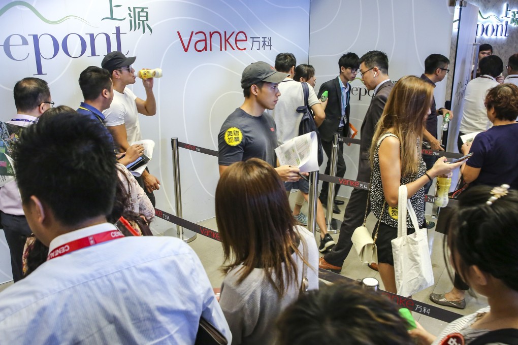 The sales centre for a China Vanke project in Hong Kong. The property developer said contracted sales in December rose by 8 per cent compared with the previous month, capping off a successful year. Photo: Edmond So