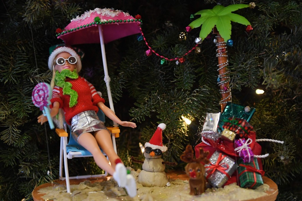 A Barbie prototype relaxes by the beach. The iconic doll is 60 this year, and she is wearing well. Photo: AFP