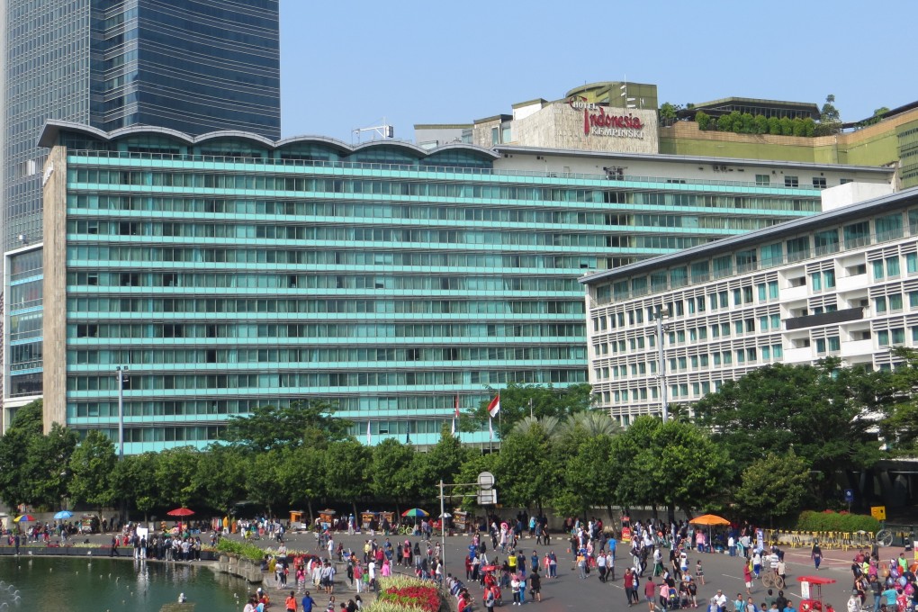 Crowds of people doing activities on the Hotel Indonesia Roundabout on a recent “car free” day, with the five-star Hotel Indonesia in the background. Photo: Shutterstock