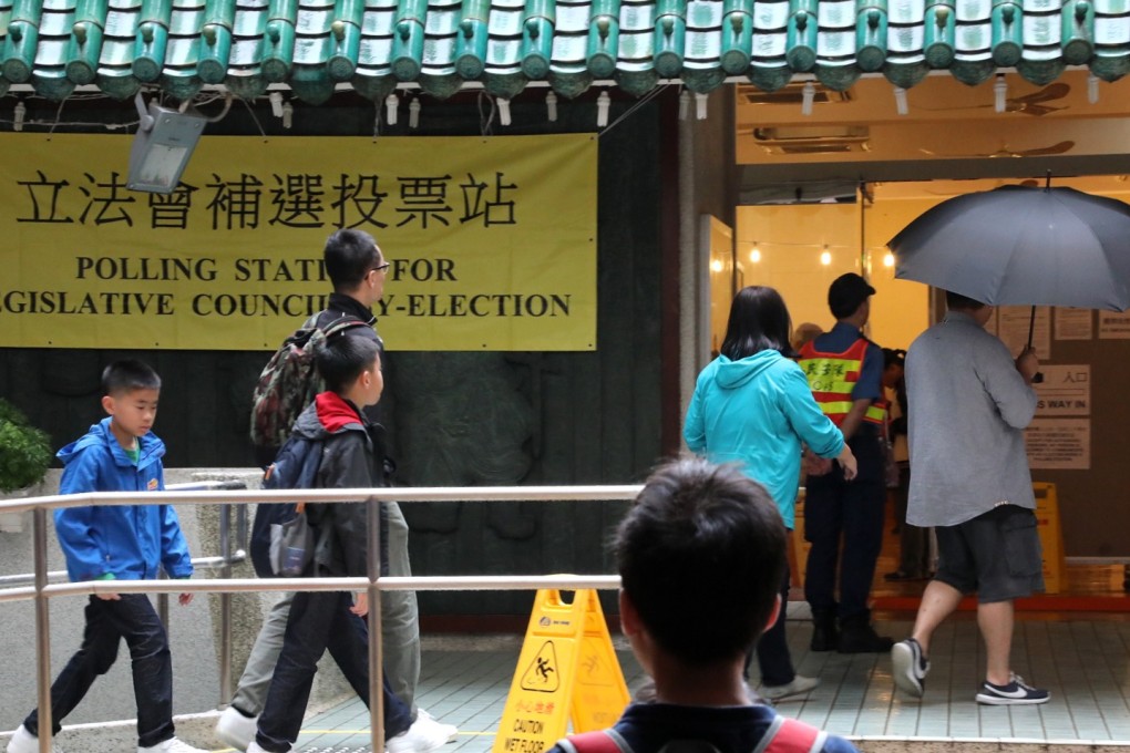 Voters arrive at a polling station for a Legislative Council by-election, in Mei Foo on November 25, 2018. Photo: Felix Wong