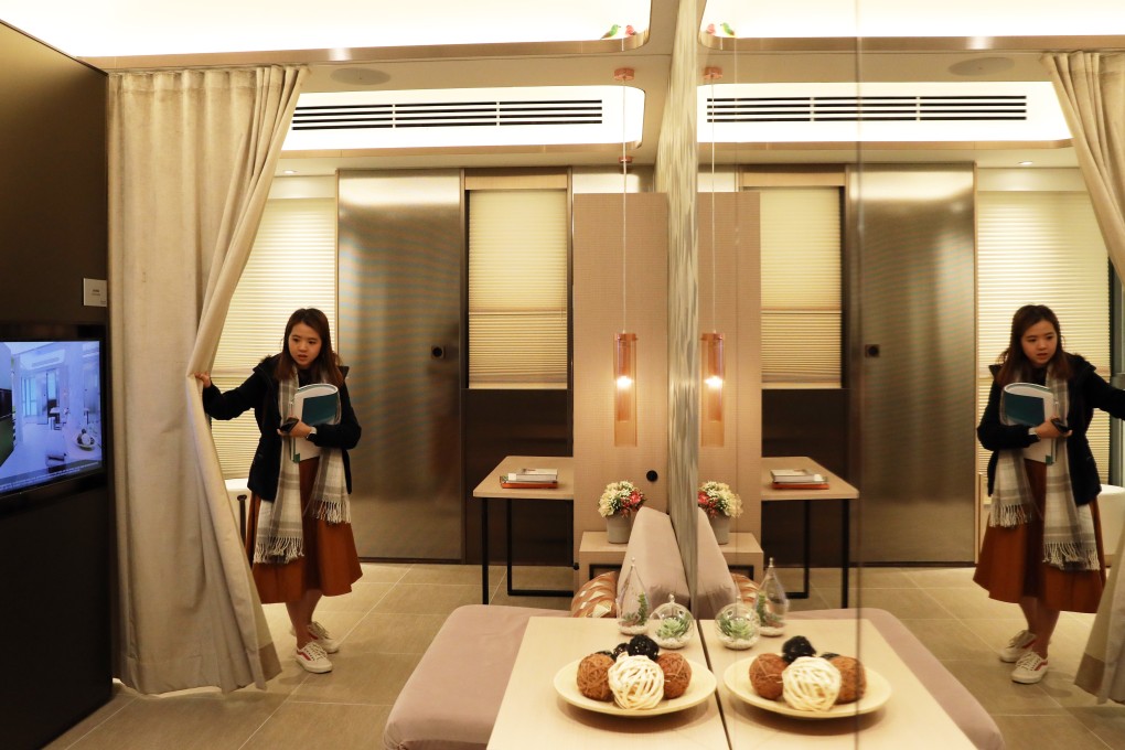 A potential buyer inspects the show flat of eResidence, the “starter homes” pilot project of the Urban Renewal Authority (URA). The development is the first batch of such subsidised for Hongkongers. Photo: Nora Tam
