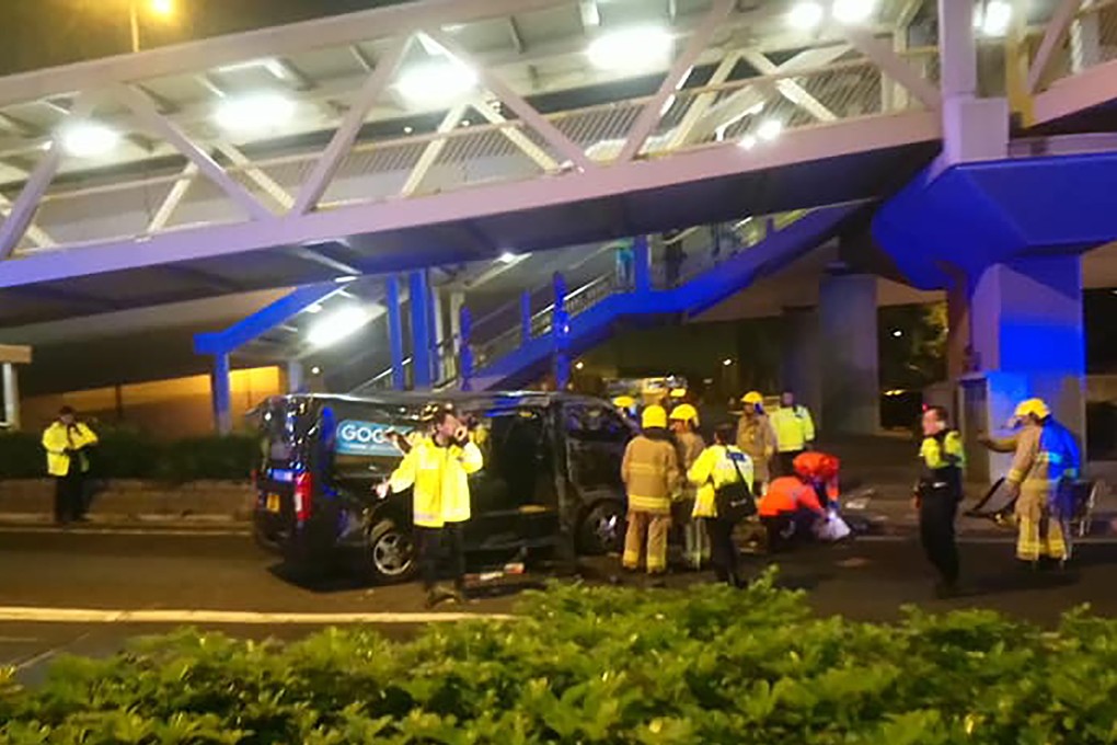 A 32-year-old woman who had rented a van from the rental company GoGoVan was thrown out in the collision on Lung Cheung Road near Hammer Hill Road in Wong Tai Sin. Picture distributed on Facebook shows firemen at the scene. Source: Facebook