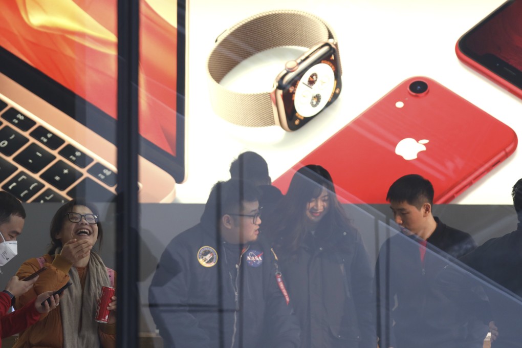 Apple CEO Tim Cook has blamed weaker demand for its products in China for a slump in sales expectations but US President Donald Trump is unconcerned. Photo: AP