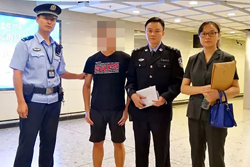 Mainland Chinese law officials take away a traveller (second from left, face pixelated) from the West Kowloon high-speed rail terminal in Hong Kong on October 27, 2018. Photo: Southern Metropolis Daily
