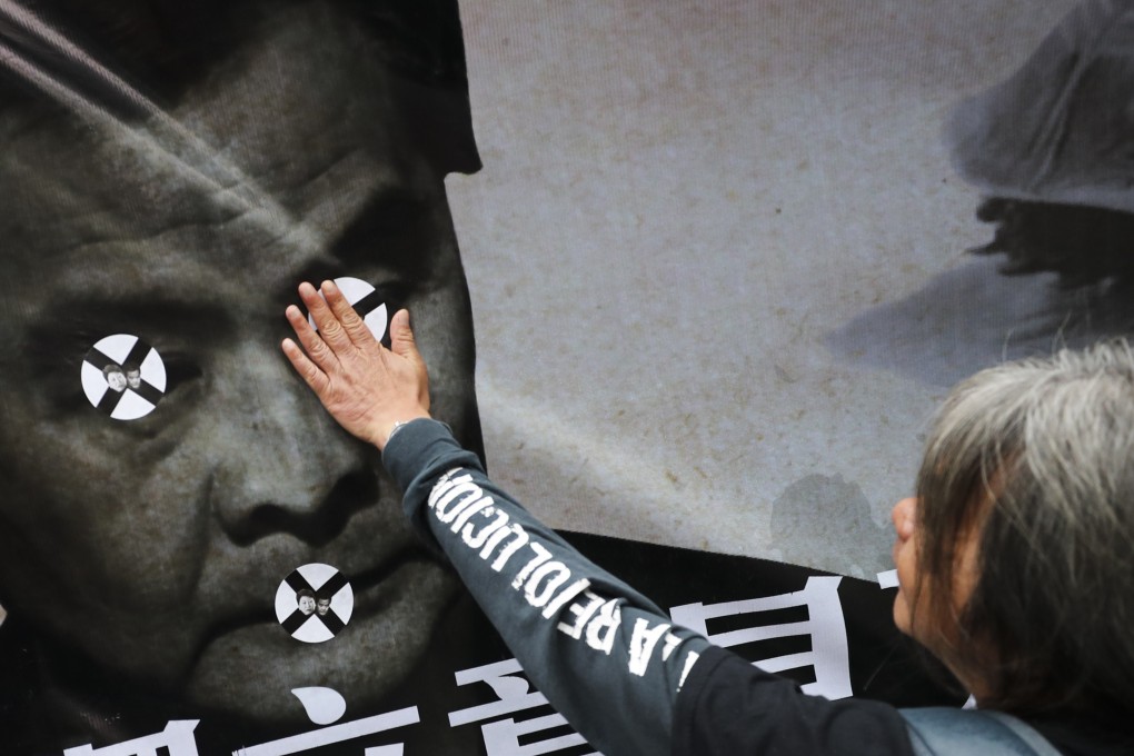 Protesters rally in Chater Garden in Central against the decision to clear former chief executive Leung Chun-ying of any wrongdoing over the UGL payment saga. Photo: Winson Wong