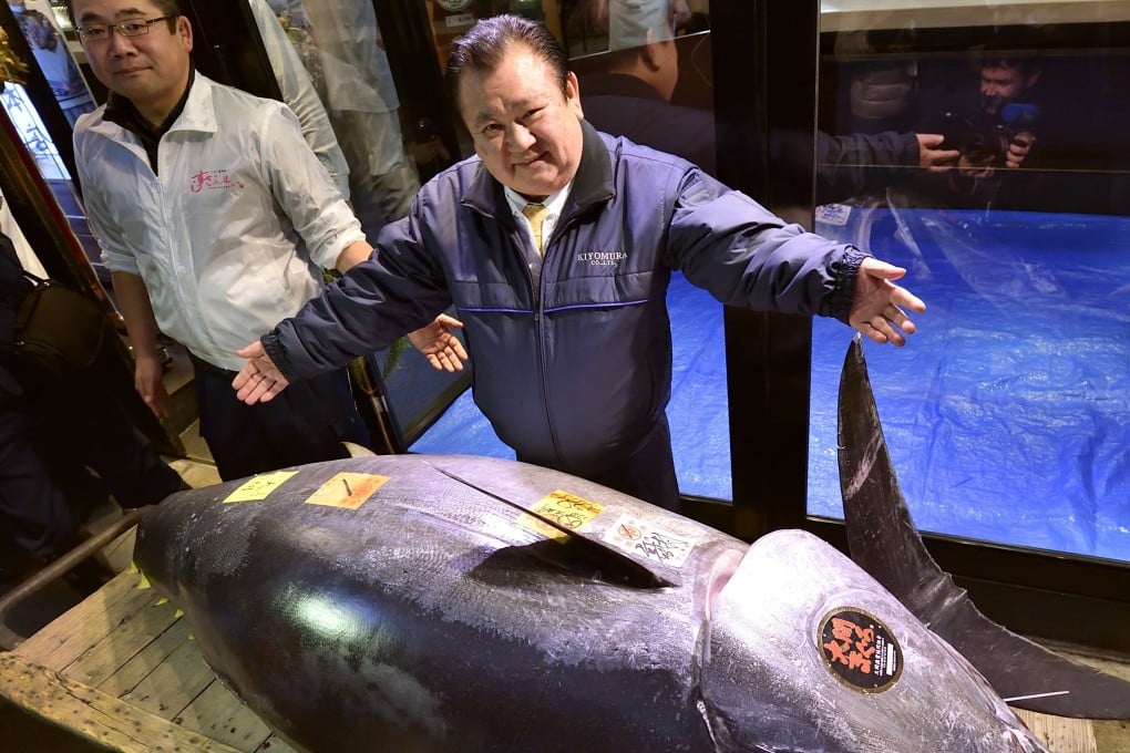 Kiyoshi Kimura, president of sushi restaurant chain Sushi-Zanmai, with his US$3.1 million tuna. Photo: AFP