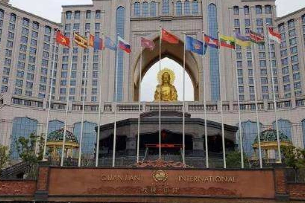 The giant golden Buddha at the Quanjian International Hotel in Jiangsu, China, has come under scrutiny as part of the public scandal rocking the health product company. Photo: Baidu.com