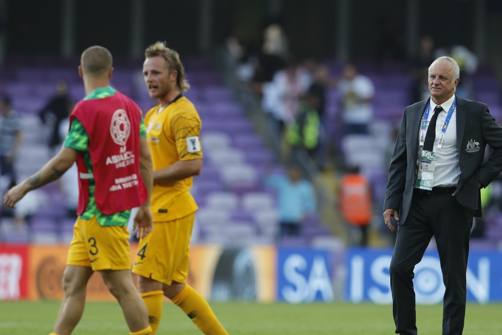 Australia's head coach Graham Arnold (R), stands on the pitch at the end of the AFC Asian Cup group B loss to Jordan. Photo: AP