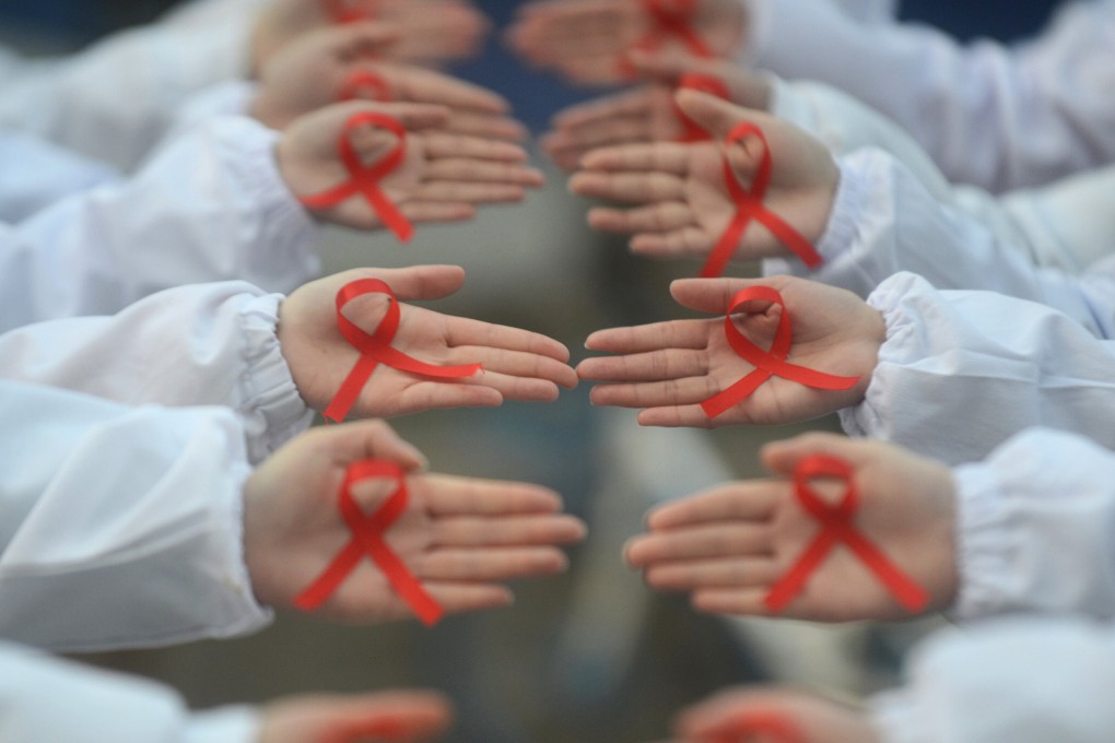 More than 820,000 people were living with HIV/Aids in China by the end of June, up 14 per cent year on year. Photo: Reuters