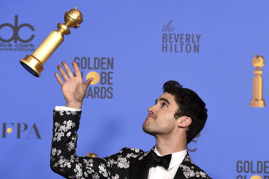 Darren Criss poses with his award. Photo: AP