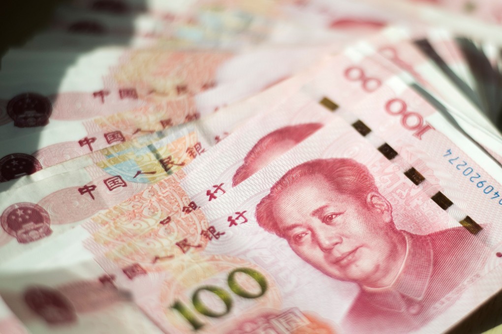 The People’s Bank of China will reduce the required reserve ratio by one percentage point this month so that banks have sufficient funds to lend. Photo: AFP