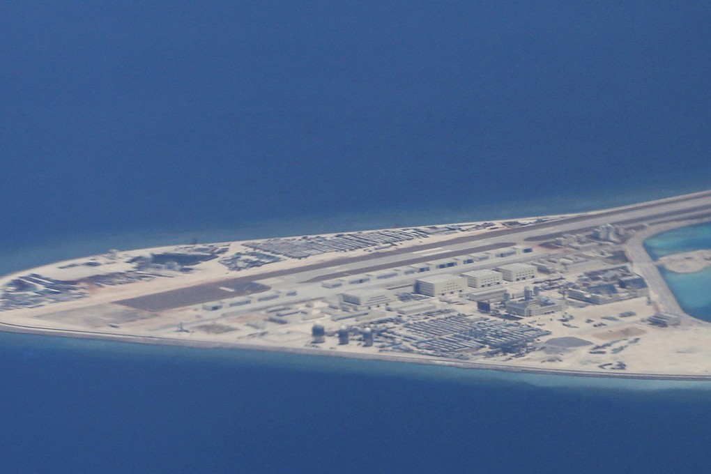 An airstrip, structures and buildings on China’s man-made Subi Reef in the disputed Spratly chain of islands in the South China Sea. Photo: AP