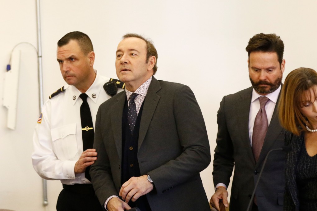 Kevin Spacey is escorted to his seat by a court officer during his arraignment at Nantucket District Court in Massachusetts on Monday. Photo: AFP