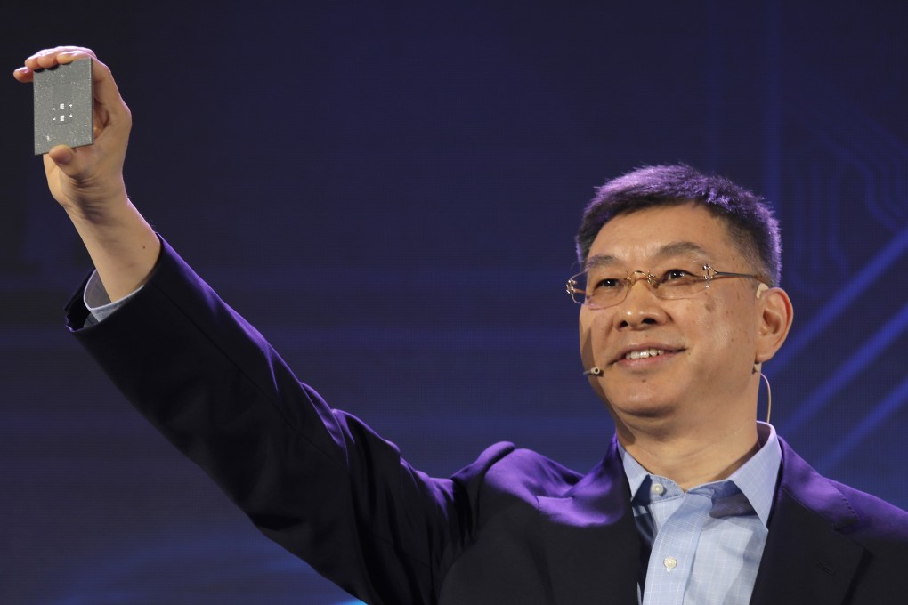 William Xu, chief strategy marketing officer at Huawei Technologies, shows off the Kunpeng 920 chip during its unveiling ceremony in Shenzhen, China, on Monday. Photo: AP