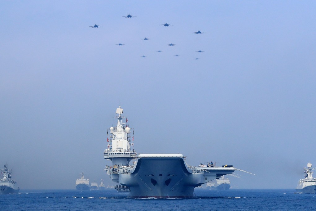 Warships and fighter jets of the Chinese People’s Liberation Army (PLA) Navy taking part in a military display in the South China Sea on April 12, 2018. Photo: Reuters