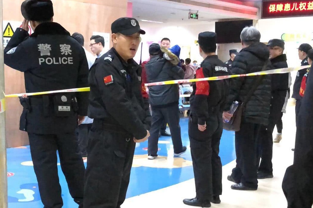 Police at the hospital where the injured children were treated. Photo: Handout