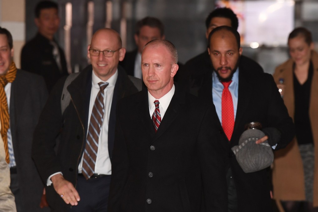 Deputy US Trade Representative Jeffrey Gerrish, centre, and members of a US government delegation leave a hotel in Beijing on Tuesday. Photo: AFP