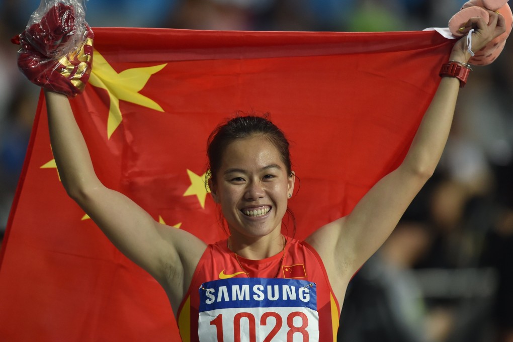 China’s Wu Shuijiao celebrates winning the 100m hurdles at the 17th Asian Games in Incheon, South Korea. Photo: AFP