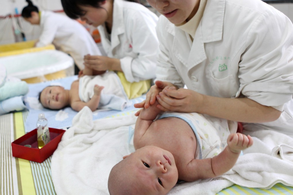 Babies increasingly are missing key bacteria in their guts, due to rising Caesarean deliveries, formula feeding and antibiotics usage. This photo, taken on December 15, 2016, shows nurses massaging babies at an infant care centre in southwest China. It is used for illustration purposes only, as no knowledge of the pictured babies’ gut bacteria is known. Photo: AFP