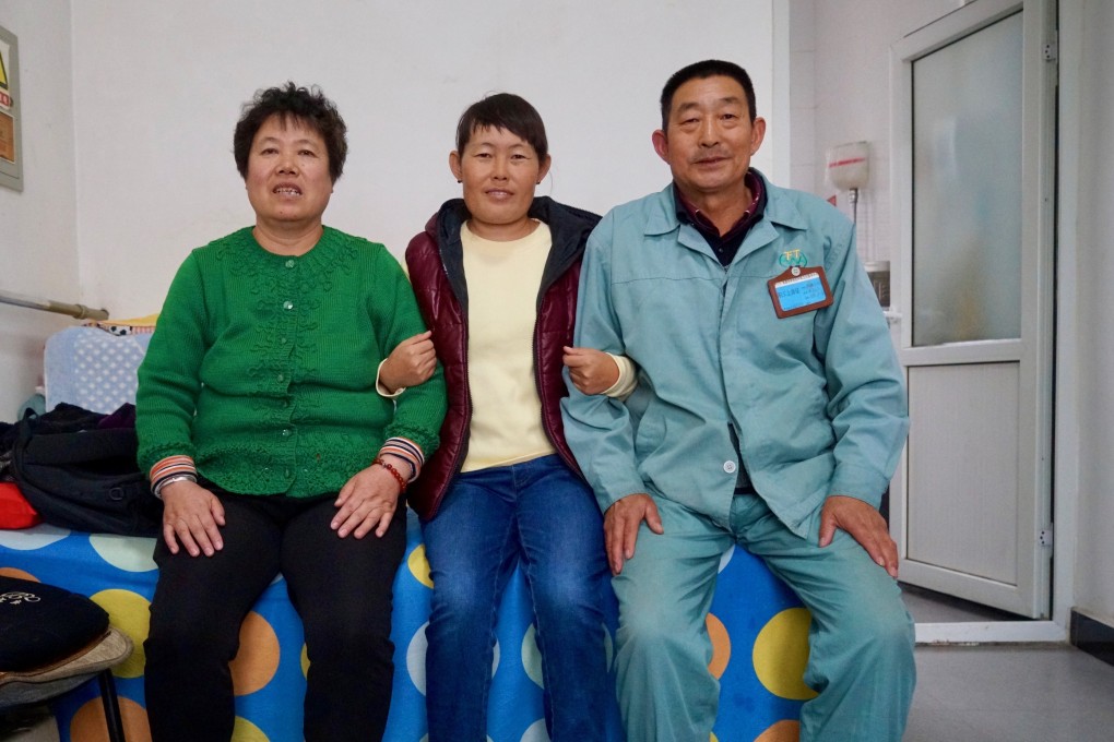 Sun with her parents Qiao Xianhua and Sun Zhentai at home in Beijing. Photo: Tom Wang