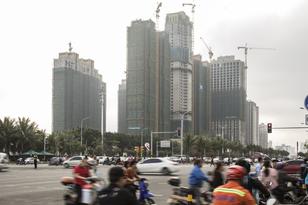 A traffic intersection in Haikou city. The local government has also imposed height restrictions on new residential buildings in the city centres of Haikou and Sanya. Photo: Bloomberg