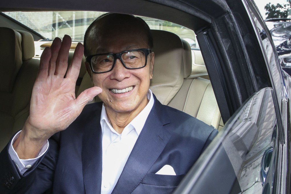 Li Ka-shing leaves his home in Deep Water Bay. The tycoon officially retired last year and relinquished managerial control of CK Hutchison, a conglomerate that had its roots in plastic flowers 50 years ago. Photo: Edward Wong