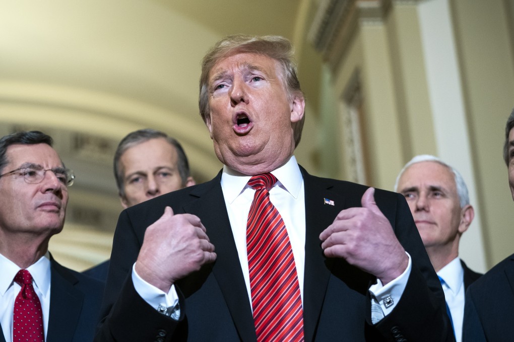 US President Donald Trump speaks to the media after attending the Senate Republican policy lunch in Washington on Wednesday. Photo: EPA