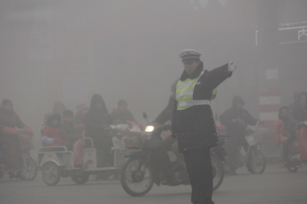 Heavy fog in the city of Anyang, in the industrial Henan province. Photo: CFP