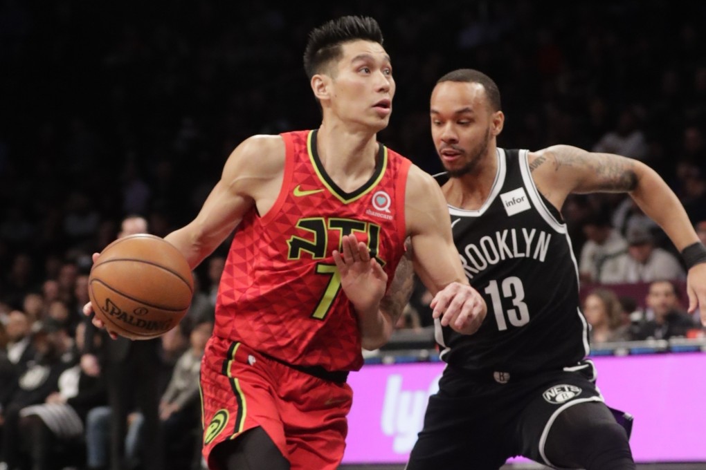 Atlanta Hawks’ Jeremy Lin drives past Brooklyn Nets’ Shabazz Napier. Photo: AP