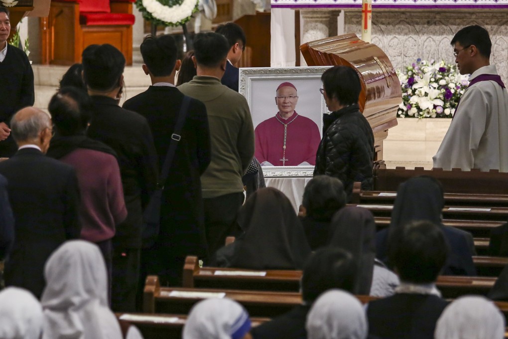 Worshippers at the Cathedral of the Immaculate Conception pay their respect to Yeung. Photo: Jonathan Wong/SCMP