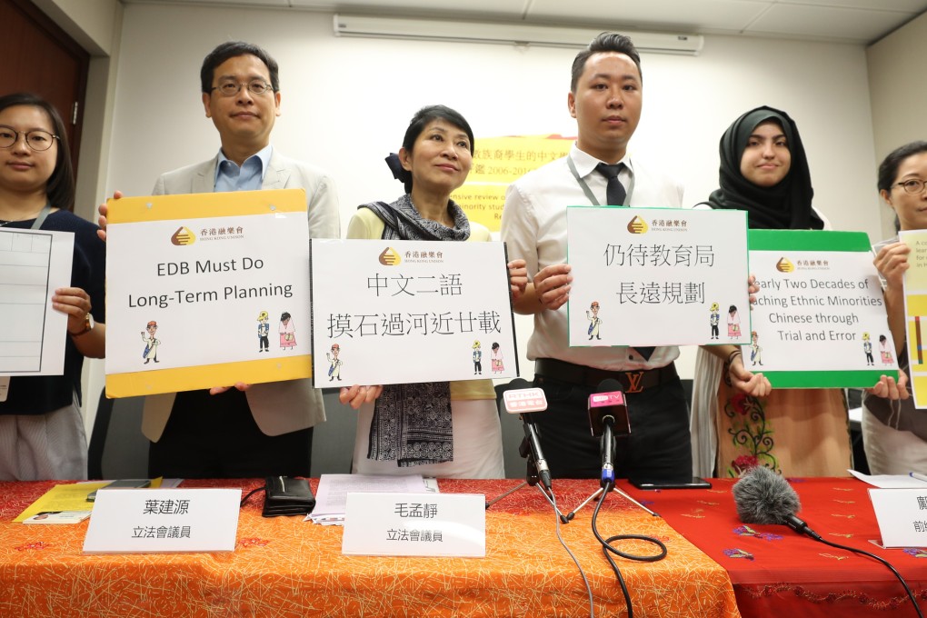 Calling for better planning on teaching Chinese to ethnic minority students are (from left), Hong Kong Unison research officer Li Sin-lam; lawmakers Ip Kin-yuen and Claudia Mo, and others, at Tamar in May 2018. Photo: Winson Wong