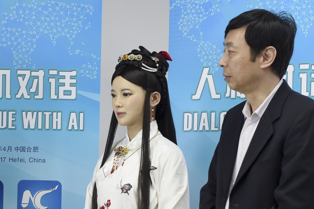 Lifelike humanoid Jia Jia (left), known as “Robot Goddess”, and her creator Professor Chen Xiaoping, who is leading development of ethical guidelines for artificial intelligence in China. Photo: Xinhua