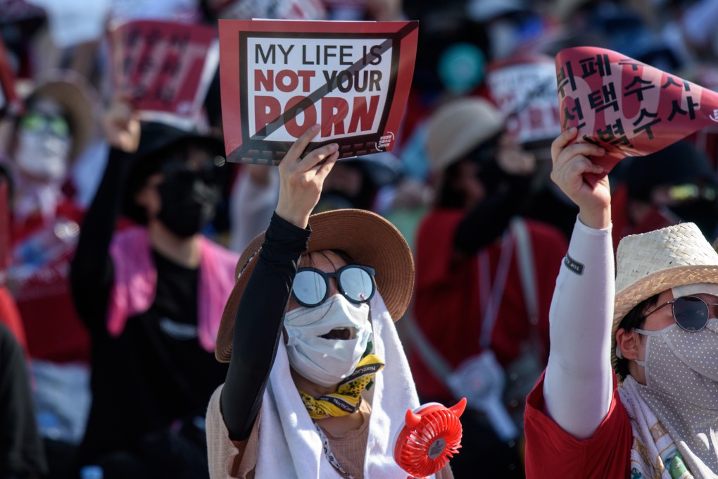 Protesters at a rally against “spycam porn” in central Seoul on August 4, 2018. Photo: AFP