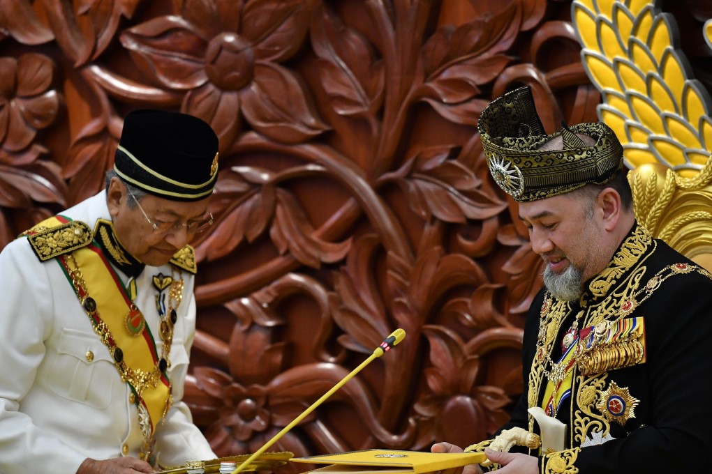 The shock abdication of Malaysia’s Sultan Muhammad V – seen here with Prime Minister Mahathir Mohamad – has prompted speculation about his successor. Photo: AFP
